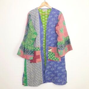 she’s 1 Oak BOHO one of a kind reversible kimono cardi.